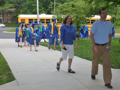 photo of South Lakes HS students walking into the building