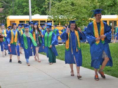 photo of South Lakes HS students walking in to the building