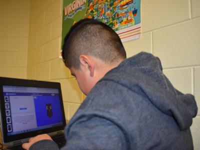 a photo of a student at laptop